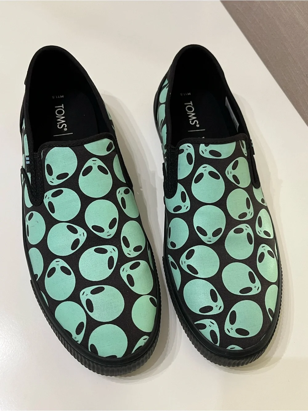 TOMS Men's 11.5 Alien Glow In The Dark Slip On Shoes Black Mint Green